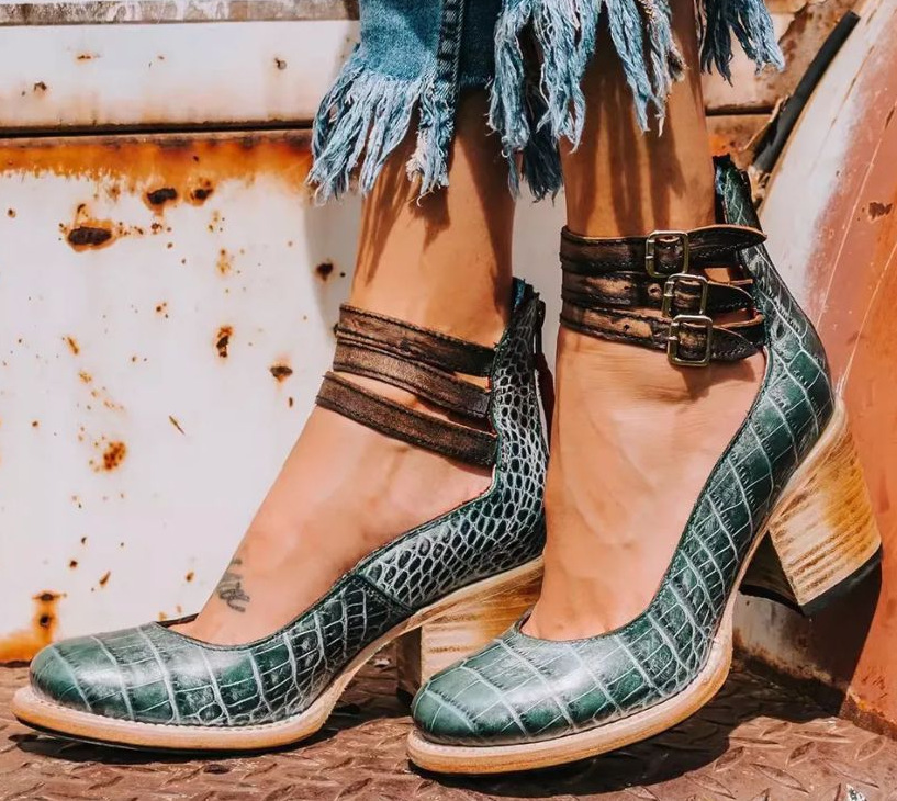 Green embossed ankle strap heeled sandals with buckle closure and block heel