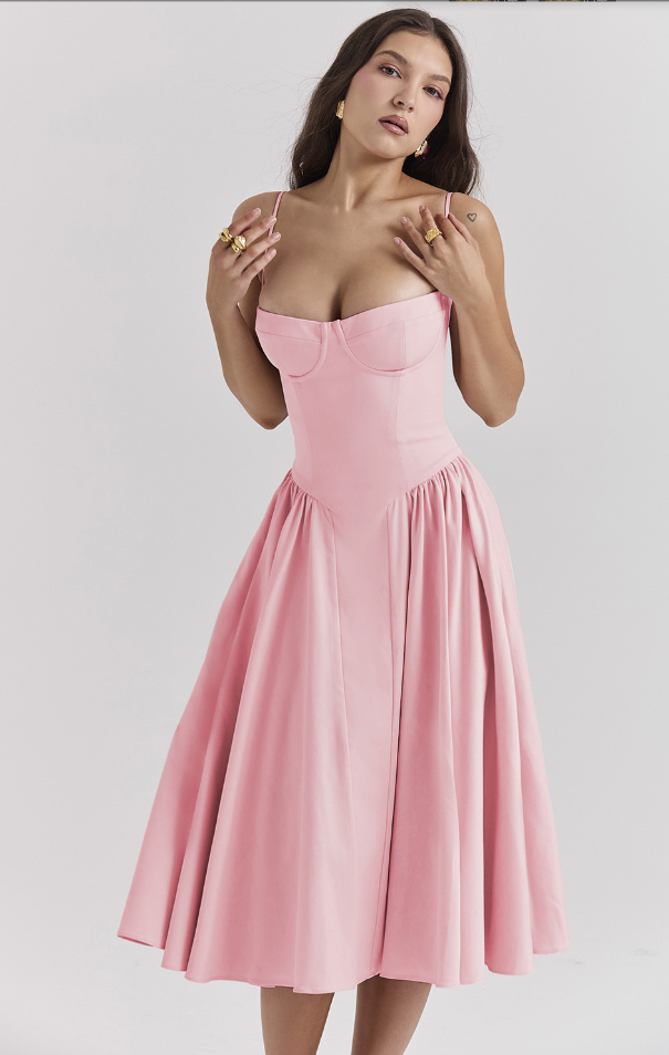 Pink corset sundress with thin straps and a gathered pleated midi skirt