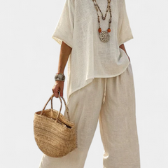 Raw linen-look blouse and wide-leg pants set in light cream, loose fit, short sleeves