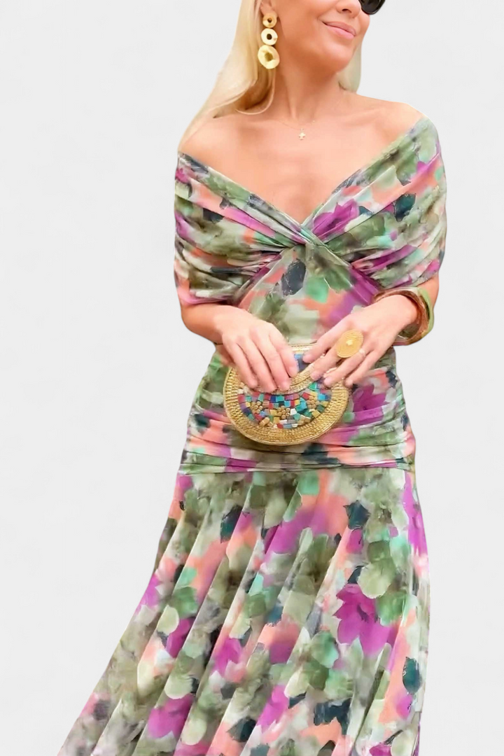 Long multicolor floral dress with twisted neckline and gathered waist detail