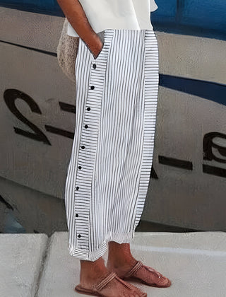 Blue-and-white striped wide-leg trousers with front button placket