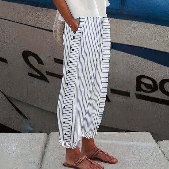Blue-and-white striped wide-leg trousers with front button placket