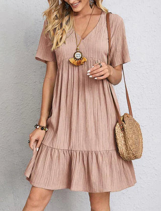 Bohemian casual dress in dusty rose, V-neck, short sleeves, tiered ruffle hem