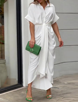 White wrap maxi dress with short sleeves, button front, and tie waist sash
