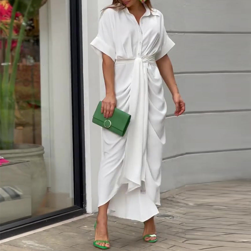 White wrap maxi dress with short sleeves, button front, and tie waist sash