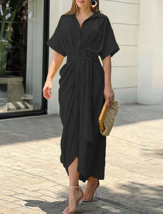 Black wrap maxi dress with short sleeves, button front, and tied waist belt