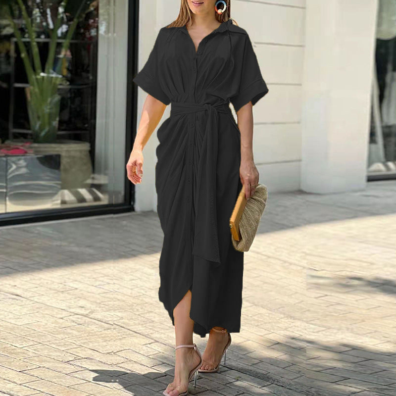 Black wrap maxi dress with short sleeves, button front, and tied waist belt
