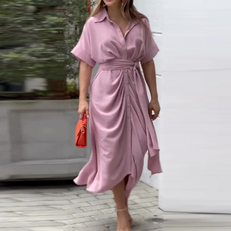 Light pink wrap maxi dress with short sleeves, button front, and tied waist