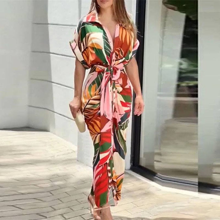 Multicolor wrap maxi dress with bold graphic print, short sleeves and tie waist