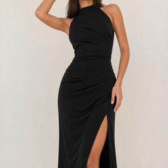 Black halter maxi dress with ruched seams and high slit at side