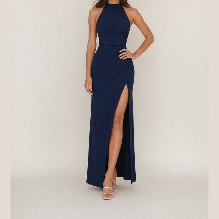 Navy halter maxi dress with fitted sleeveless bodice and high front slit