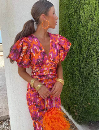 Red and orange abstract midi dress with V-neck and puff sleeves