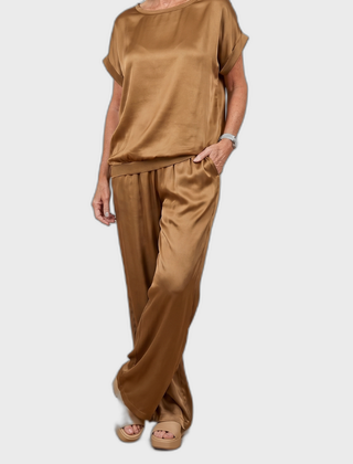 Brown satin lounge set with short-sleeve top and drawstring wide-leg pants