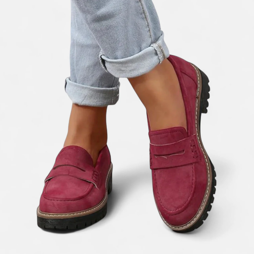 Kaye™ red loafers with buckle strap, slip-on moc seams, and contrast-trim lug sole