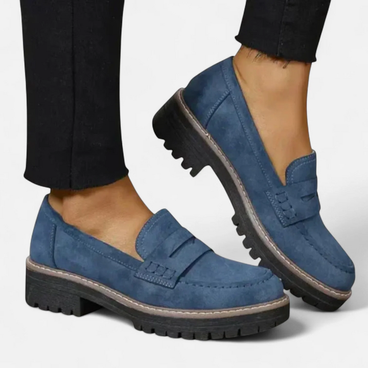 Kaye™ blue loafers with buckle strap, moc toe seams, and thick lug sole with contrast trim