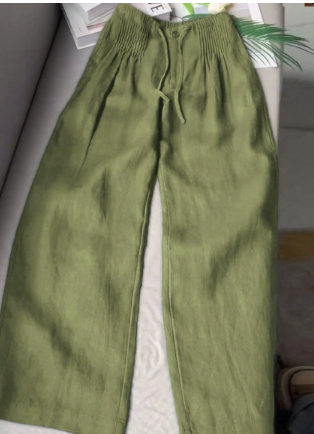 Green wide-leg trousers with elastic waistband, drawstring, and front button
