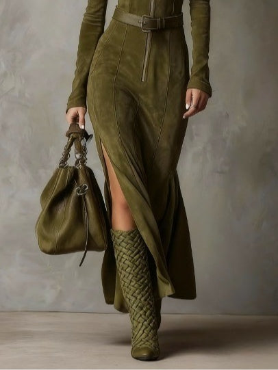 Olive suede maxi dress with front zip, waist belt, long sleeves, and angled seams