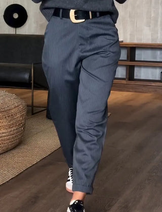 Sleek tailored pants in dark blue pinstripe, cuffed hem, belt loops, side seam crease