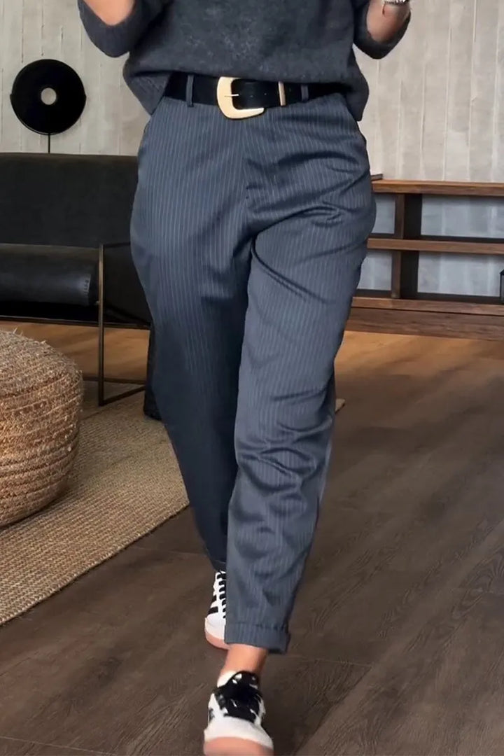 Sleek tailored pants in dark blue pinstripe, cuffed hem, belt loops, side seam crease