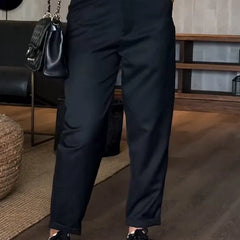 Sleek tailored pants in navy, tailored fit with crease, belt loops, cuffs at ankle