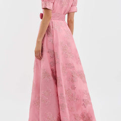 Pink short puff-sleeve maxi dress, belted waist, textured pattern, side view