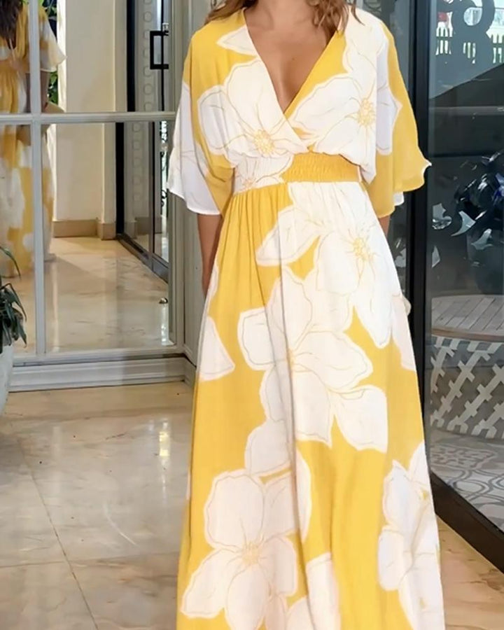 Yellow and white floral wrap maxi dress with V-neck and tie waist, three-quarter sleeves