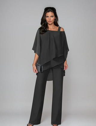 Black layered two-piece set with draped cold-shoulder top and wide-leg trousers