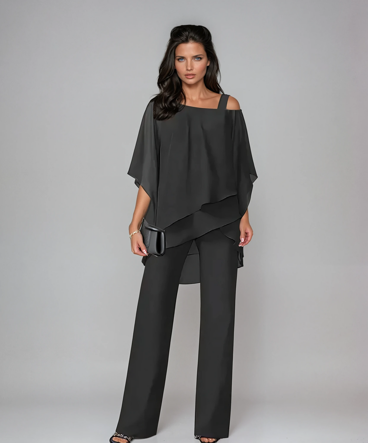 Black layered two-piece set with draped cold-shoulder top and wide-leg trousers