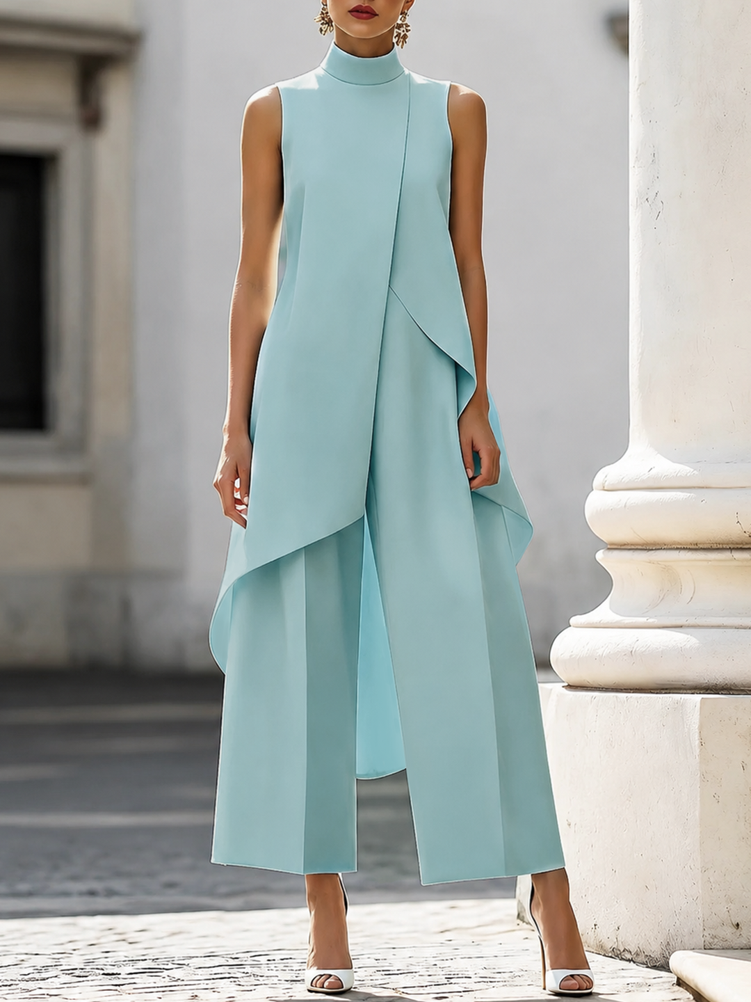 Light blue sleeveless tailored set with draped asymmetric vest top and wide-leg pants