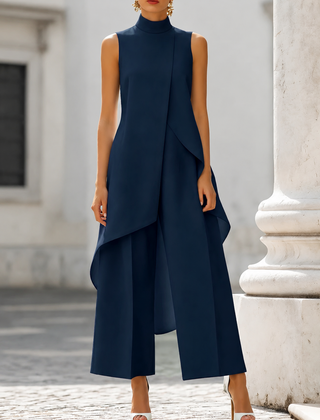 Navy blue sleeveless tailored set with draped asymmetric vest top and wide-leg pants