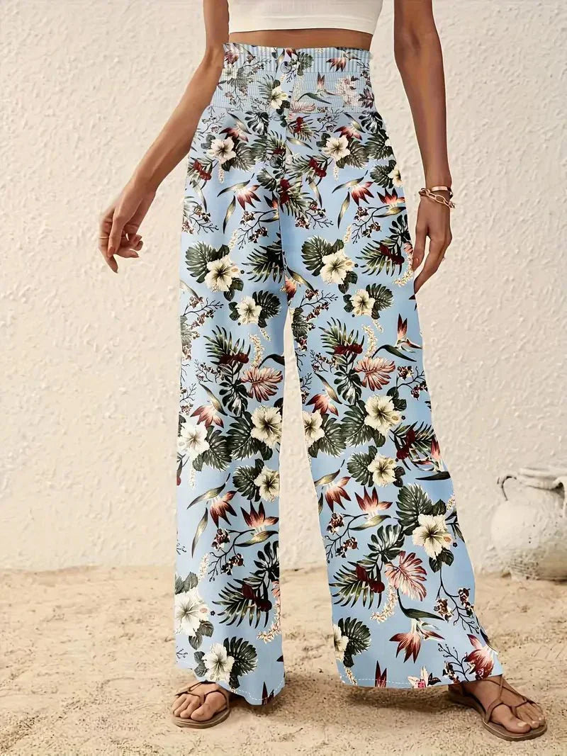 Light blue floral wide-leg trousers with multicolor foliage and flower print