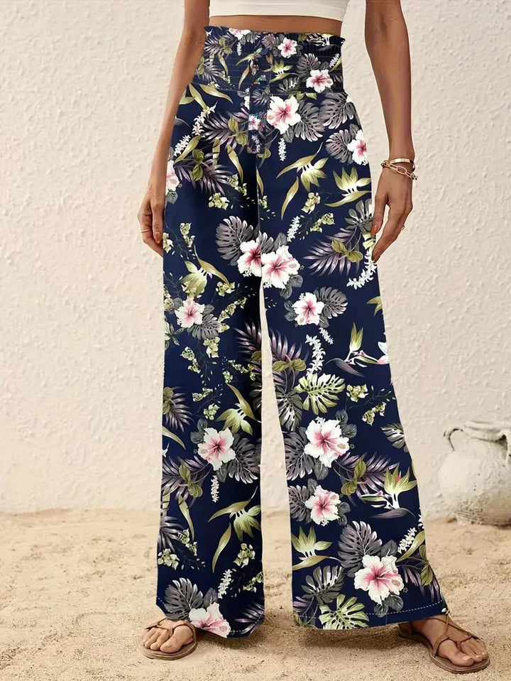 Navy floral wide-leg trousers with pink and white flowers, high-rise waistband