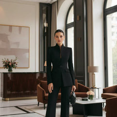 Black tailored blazer and wide-leg palazzo pants set with notch collar, fitted waist.