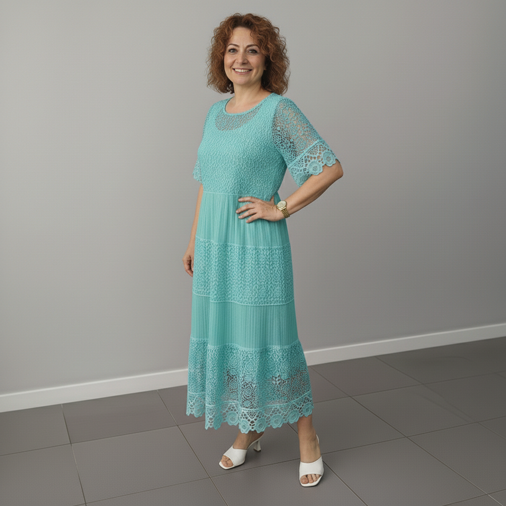 Teal lace midi dress, short lace sleeves and layered tiers at the skirt