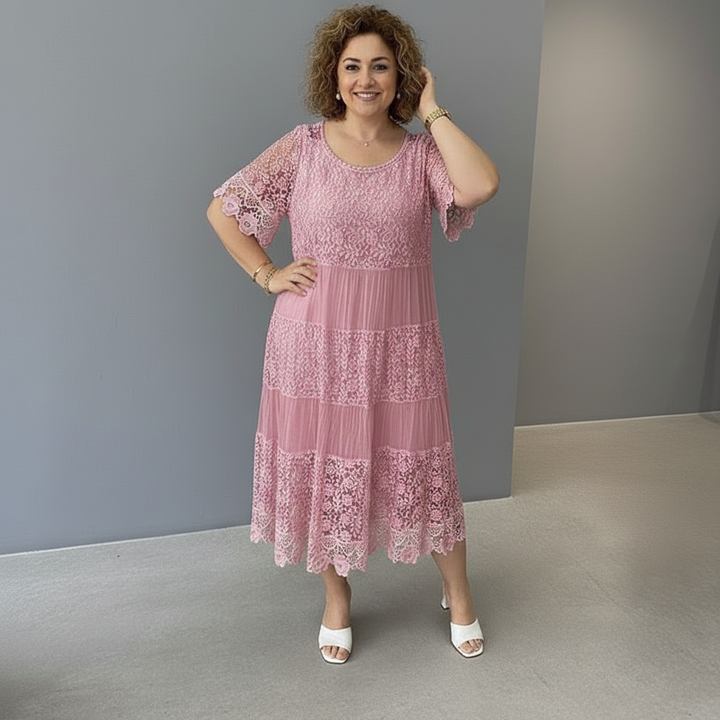 Dusty pink lace midi dress with short lace sleeves and tiered skirt panels