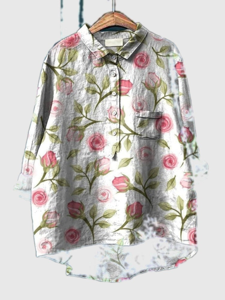 Embroidered floral shirt in white with pink roses and green leaves, button-up front