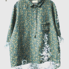 Embroidered floral shirt in dusty green with small gold leaf pattern, button-up front and pocket