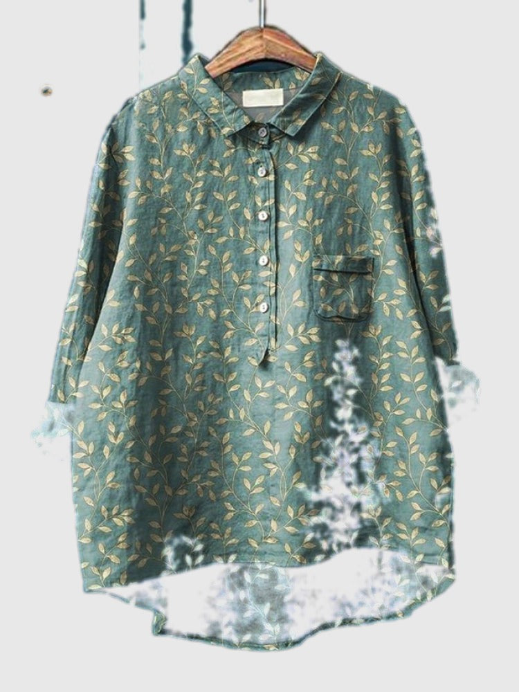 Embroidered floral shirt in dusty green with small gold leaf pattern, button-up front and pocket