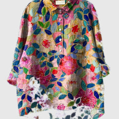 Embroidered floral shirt with multicolor leaves and pink rose accents, button-up front