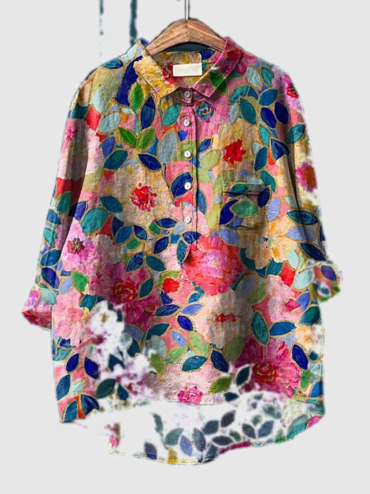 Embroidered floral shirt with multicolor leaves and pink rose accents, button-up front