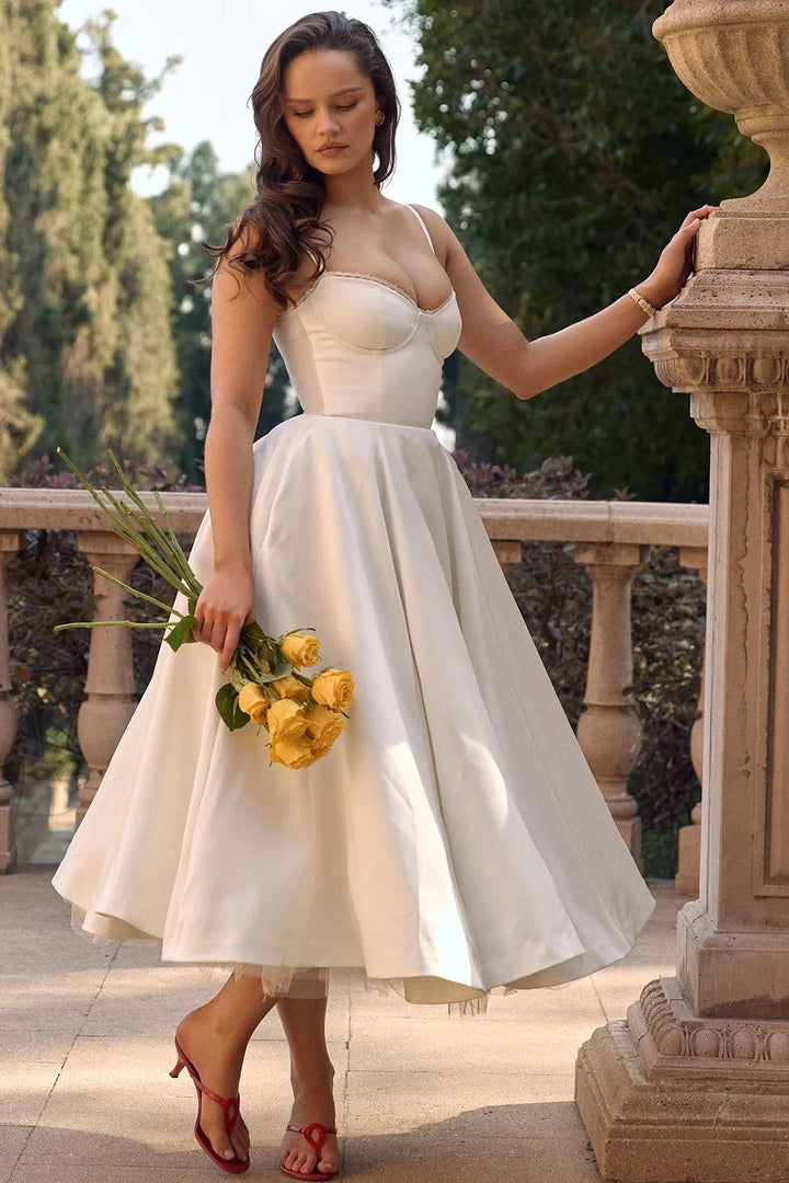 White flared tulle-accent dress with spaghetti straps and sweetheart neckline