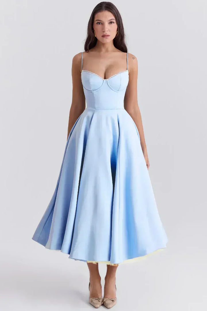Light blue fit-and-flare dress with thin straps, sweetheart bodice, and full flared skirt.