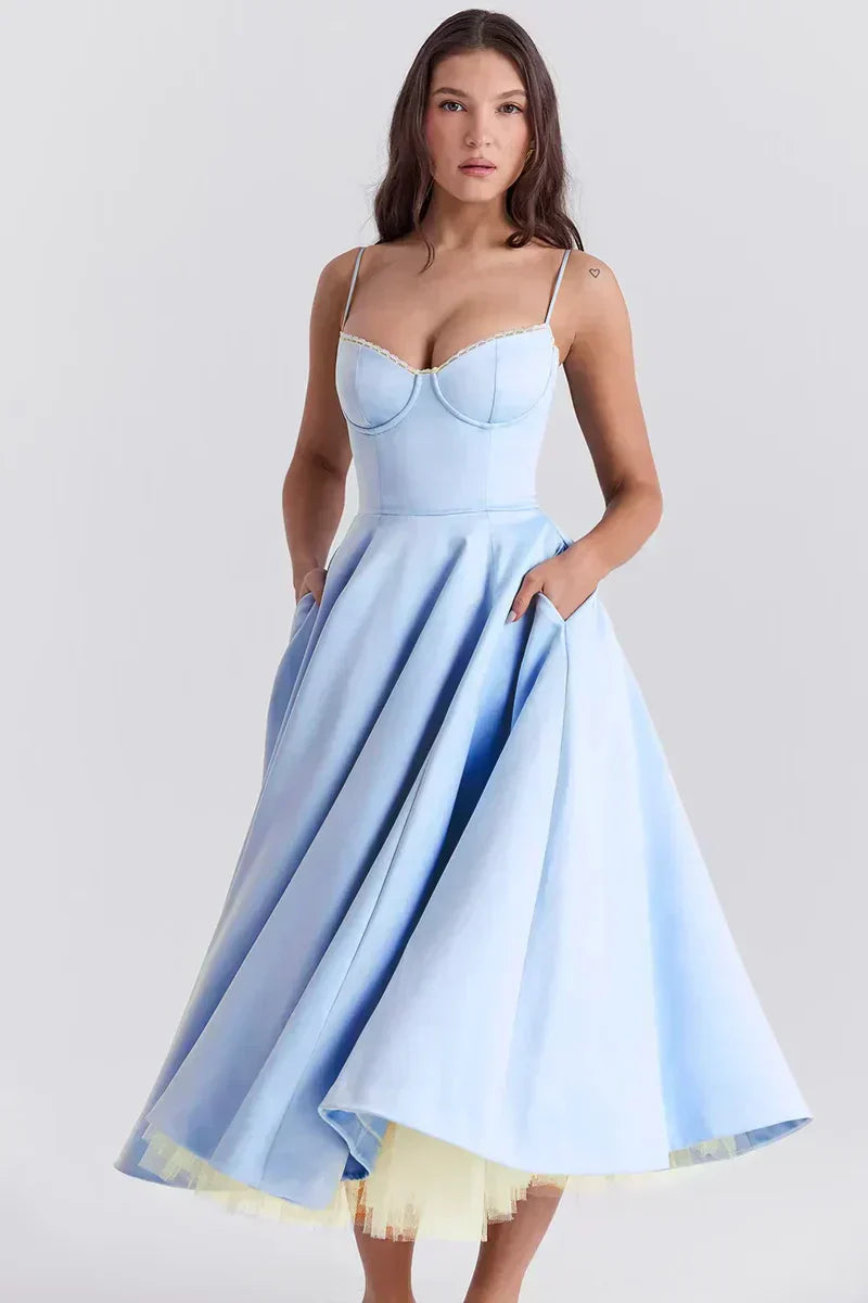 Light blue corset-style dress with spaghetti straps, sweetheart neckline, and flared skirt.