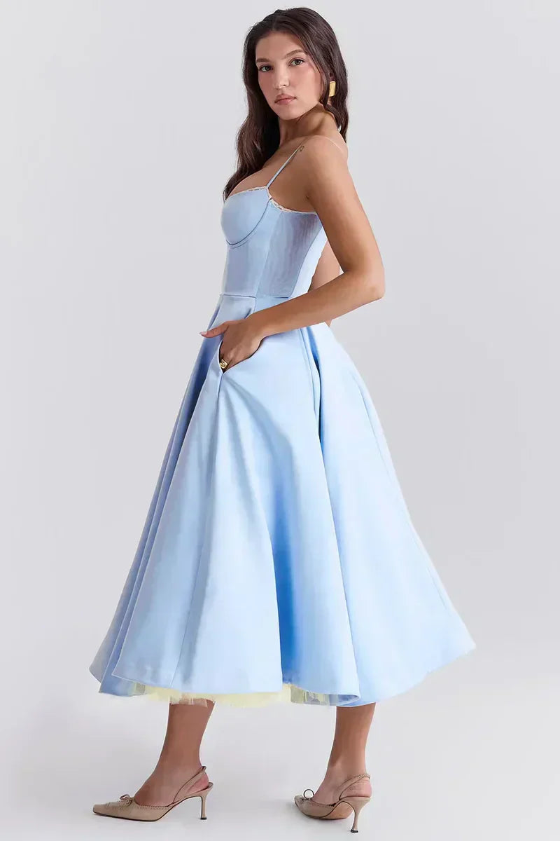 Light blue sleeveless fit-and-flare dress with spaghetti straps and sweetheart bodice.