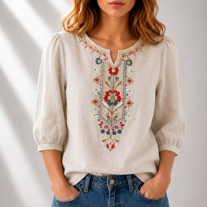 Beige embroidered floral blouse with puff sleeves and V-neck buttonless trim