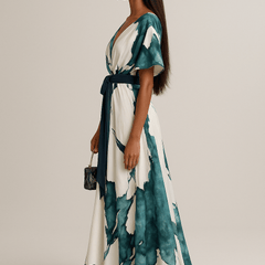 Teal-and-white watercolor maxi dress side view with V-neck and tie waist belt