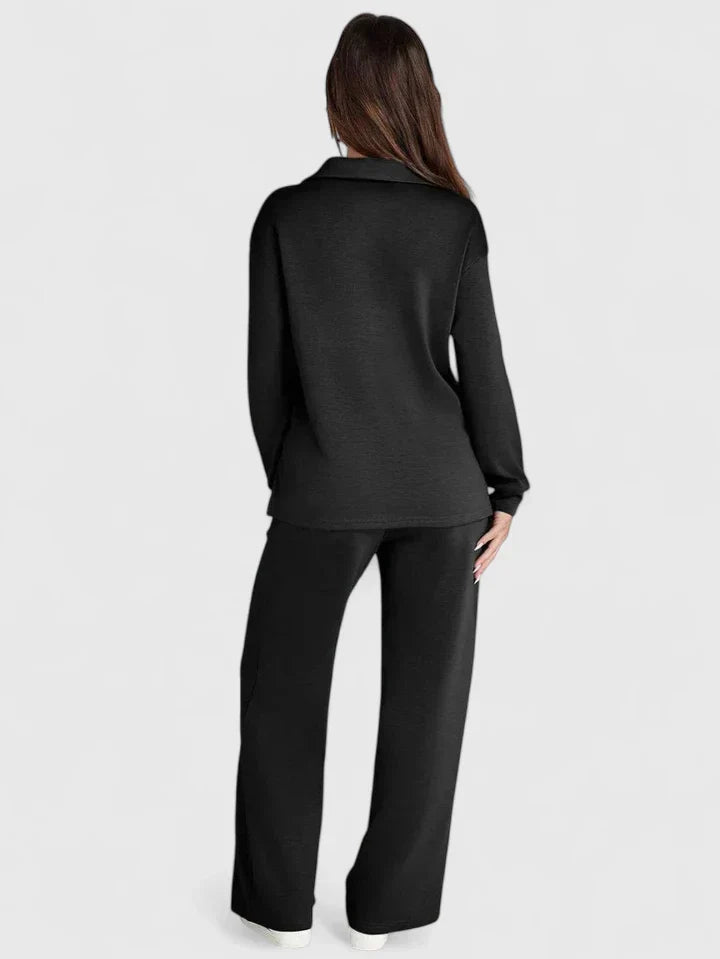 Black two-piece set, back view: long-sleeve V-neck top and wide-leg drawstring pants