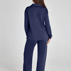 Navy long-sleeve top and wide-leg drawstring pants, back view