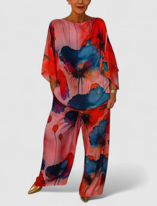 Two-piece set with drape-sleeve blouse and wide-leg pants, red and blue floral print