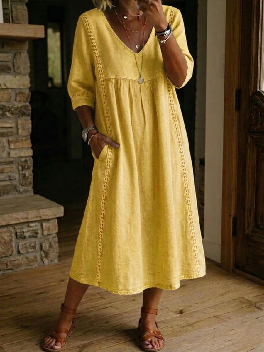 Mustard yellow V-neck maxi dress with 3/4 sleeves and gathered bodice